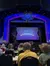 The image shows a theater stage set for