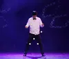 The image shows an acrobat balancing on a unicycle on top of a giant ball with colorful glowing background and quotes praising the New Shanghai Circus