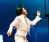 The image showcases multiple performers dressed as Elvis Presley each striking iconic poses from different eras with the text Choose Your Elvis in the center