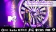 A dramatic scene features two performers in front of a large fan with sparks flying, promoting an unexplainable magic show with logos of major TV networks at the bottom.