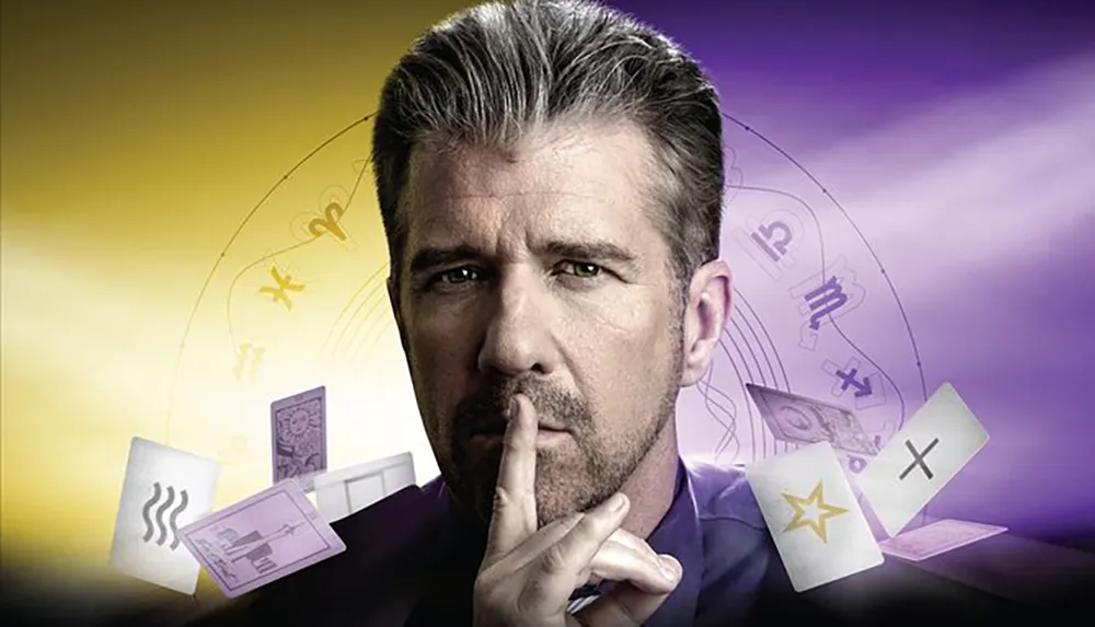 A man is holding his finger to his lips in a shushing gesture surrounded by floating cards and astrological symbols on a gradient purple and yellow background